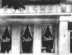  Windows of a Jewish-owned business in Berlin painted with the word "Jude" (Jew). [LCID: 00239]