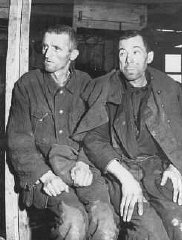 Two malnourished Soviet prisoners of war, survivors of the Hemer prisoner of war camp in western Germany.