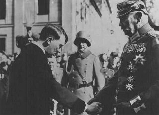 Recently appointed as German chancellor, Adolf Hitler greets President Paul von Hindenburg in Potsdam, Germany, on March 21, 1933.