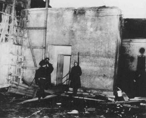 Soviet soldiers guard the entrance to Hitler's underground bunker