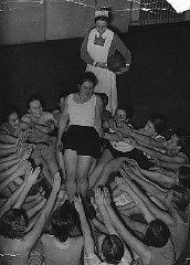 Members of the Nazi girls' organization, the League of German Girls (BDM), do a group exercise.