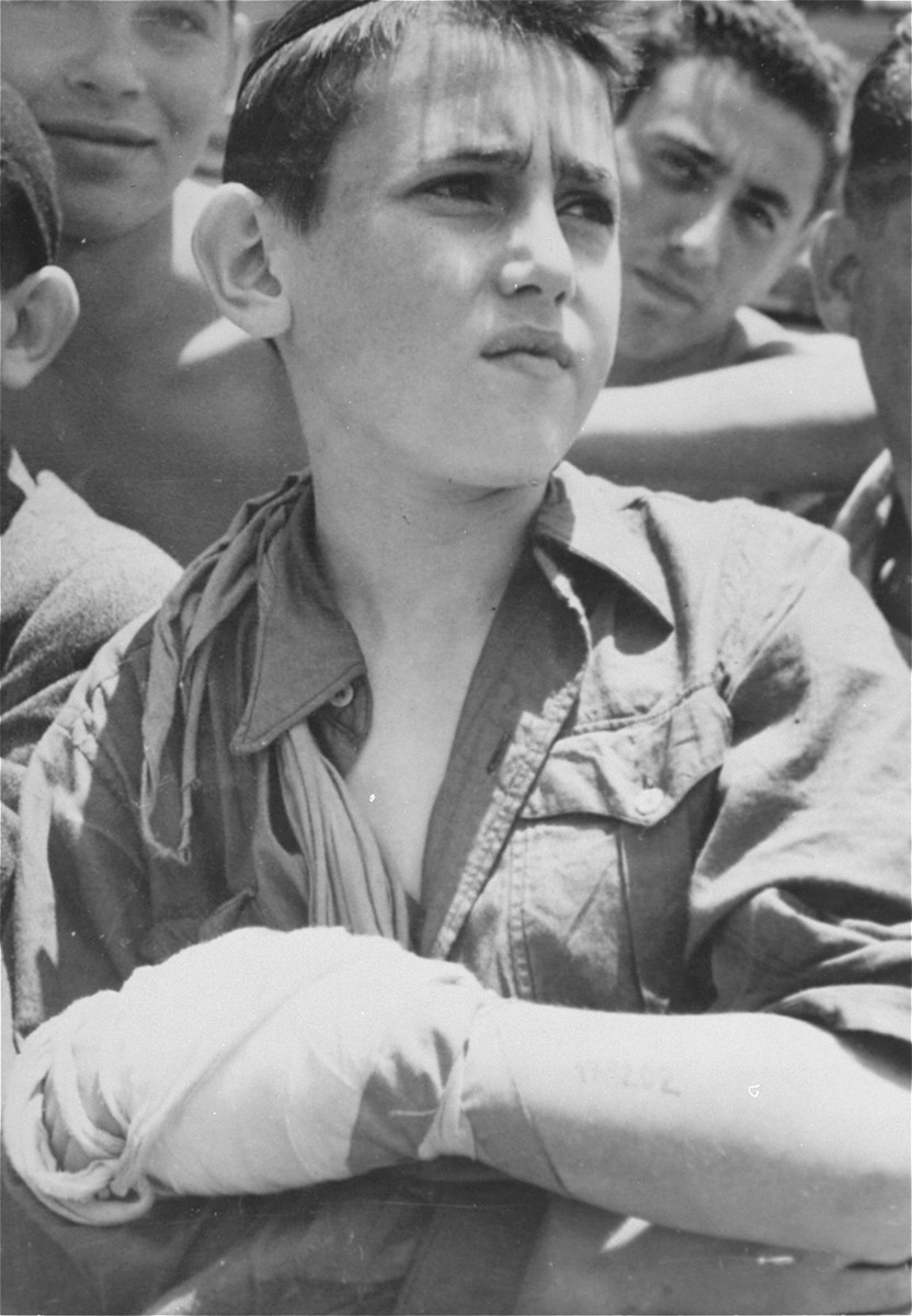 A child survivor arrives at Haifa port on board the Aliyah Bet ("illegal" immigration) ship "Mataroa." [LCID: 69895]