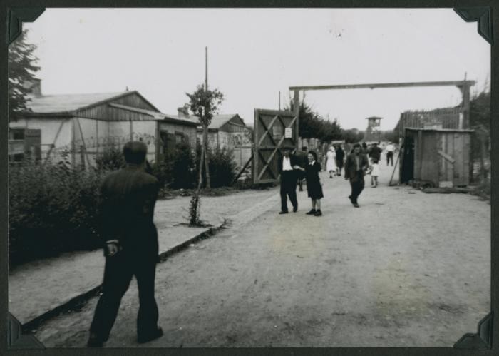 Jewish displaced persons enter the main gate of the Ziegenhain displaced persons camp.