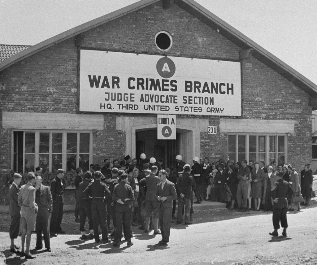 A crowd waits outside the American military court for the announcement of a verdict in the Malmedy war crimes trial of SS soldiers ... [LCID: 81991]