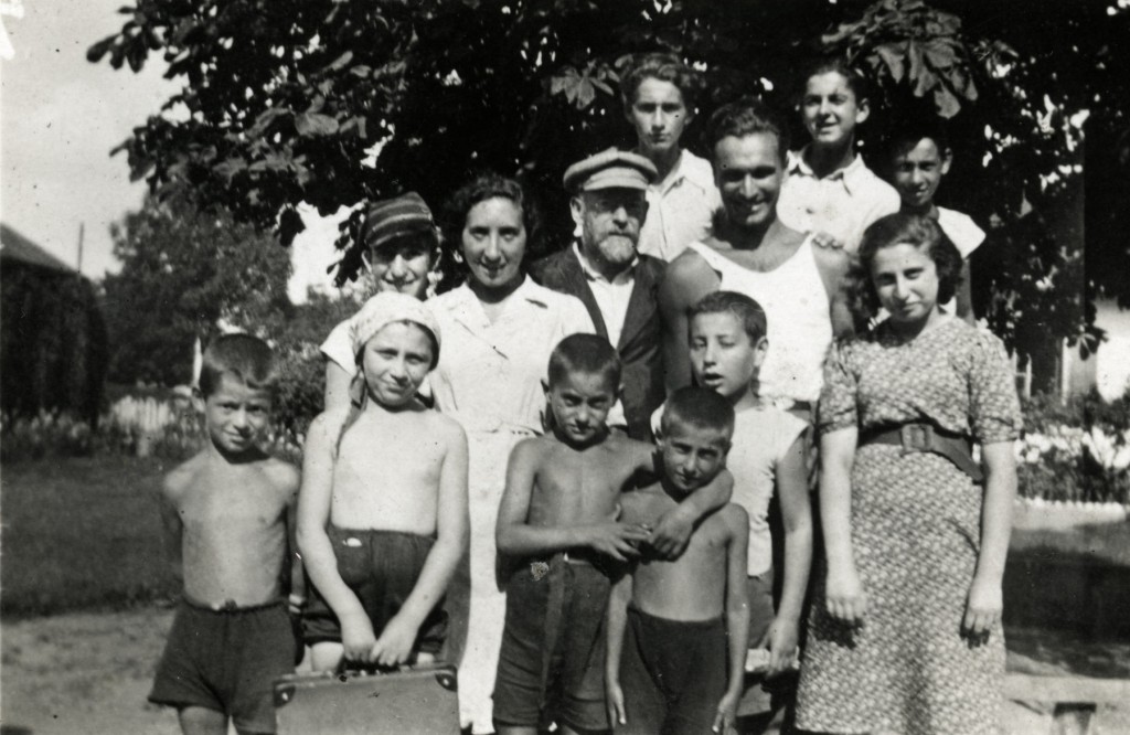 Janusz Korczak poses with children and staff in his orphanage