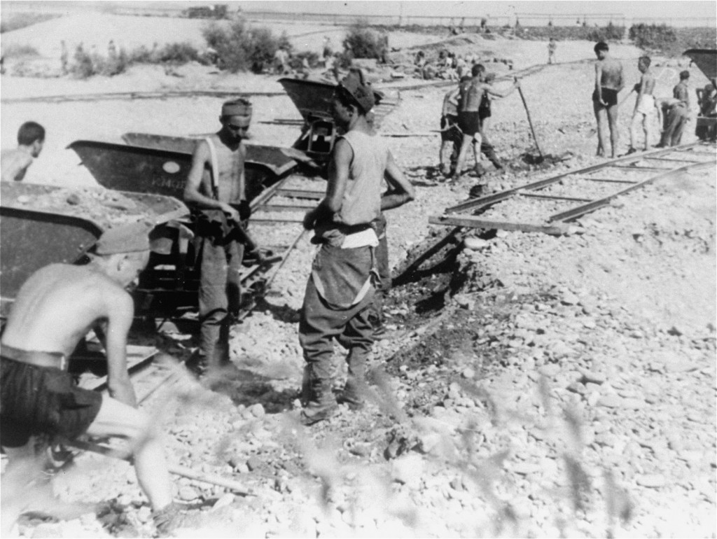 Conscripts of Hungarian Labor Service Company VIII/2 at work laying railroad track. [LCID: 12391]