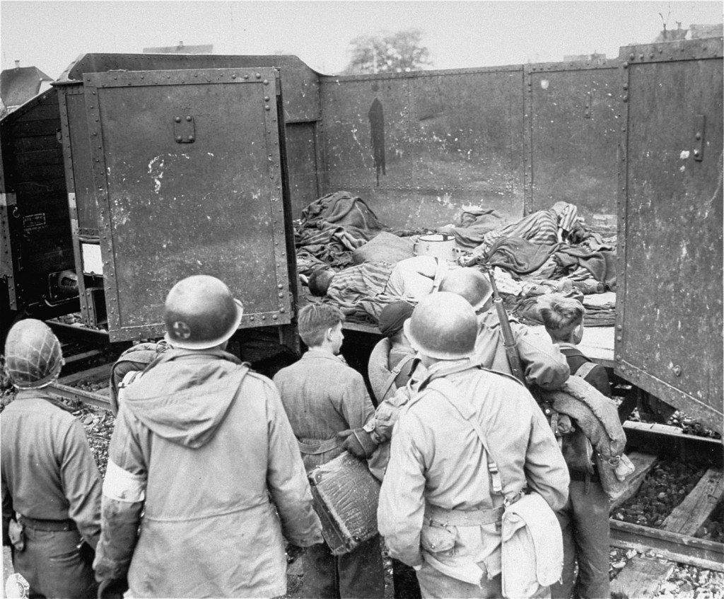US soldiers discovered these boxcars loaded with dead prisoners outside the Dachau camp. [LCID: 0555]