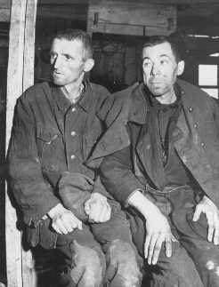 Two malnourished Soviet prisoners of war, survivors of the Hemer prisoner of war camp in western Germany. [LCID: 37308]