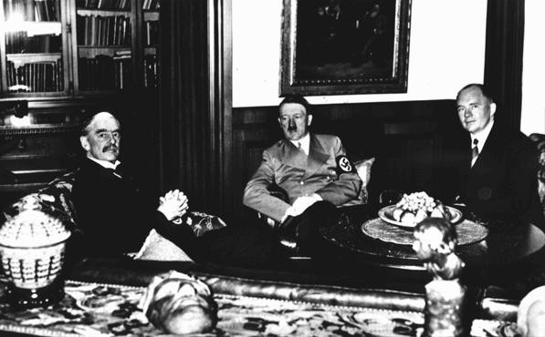 British prime minister Neville Chamberlain (left), German chancellor Adolf Hitler (center), and French premier Edouard Daladier (right) ... [LCID: 13454]