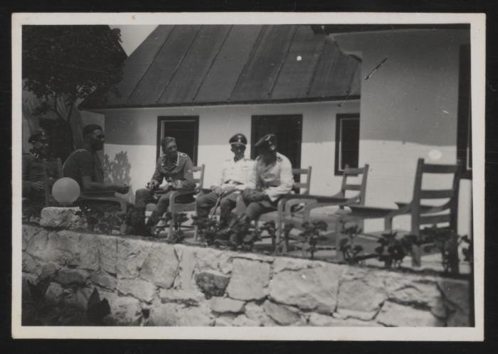 SS personnel at the Sobibor killing center relax on a terrace