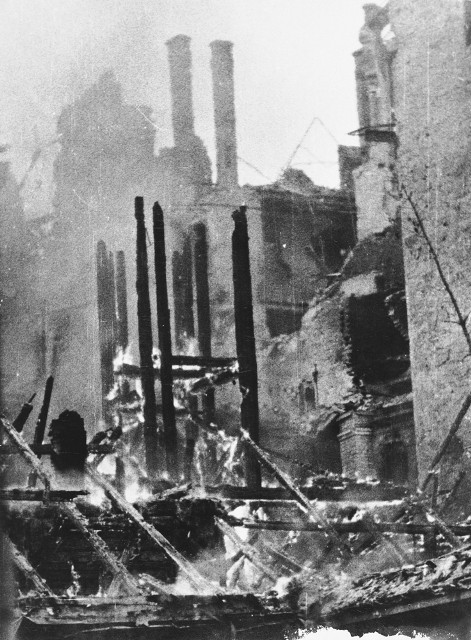 View of the smoldering ruins of a building in Warsaw following a German aerial attack. [LCID: 64518]