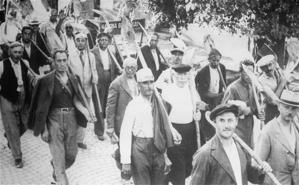 Jews drafted into the Hungarian Labor Service System march to a work site.