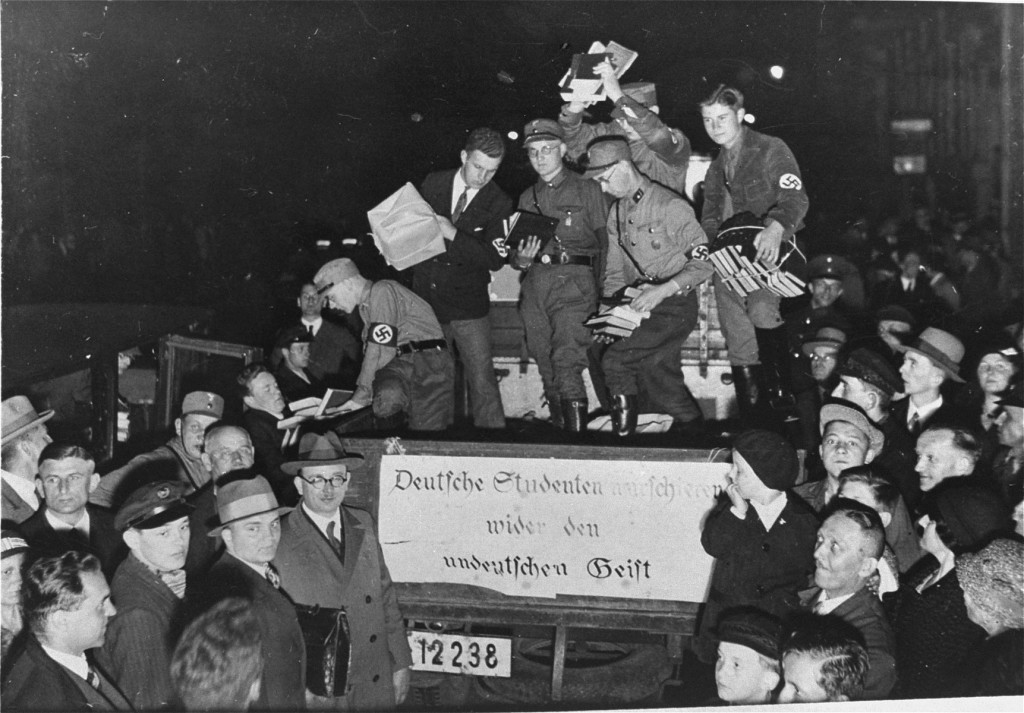 Students and members of the SA unload books deemed "un-German" during the book burning in Berlin.