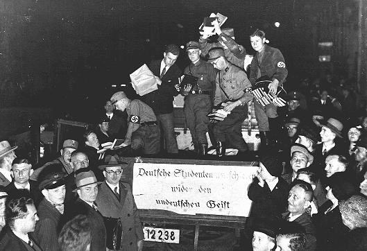 Students and members of the SA unload books deemed "un-German" during the book burning in Berlin.