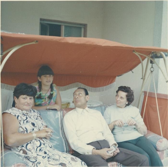 <p><span style="font-weight: 400;">Anna Gutman (Boros) (left) and her daughter, Carla (second from left), visit with Dr. Mohamed Helmy (secone from right) and his wife, Emmi (right), in Berlin in 1968. Dr. <a href="/narrative/45338">Helmy</a> hid Gutman in his home for the duration of World War II. </span></p>