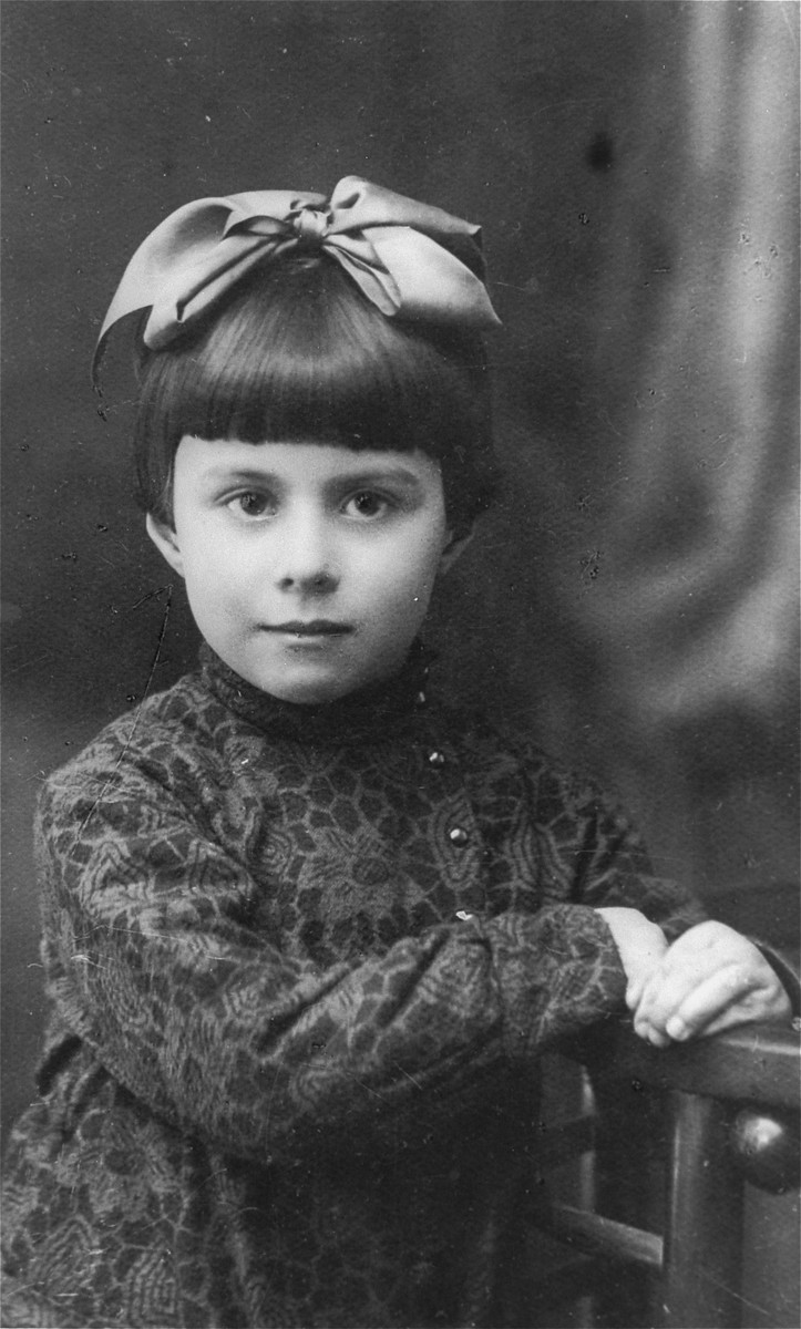 1935 portrait of three-year-old Anna Glinberg, a Jewish child, who was later killed during the mass execution at Babi Yar.