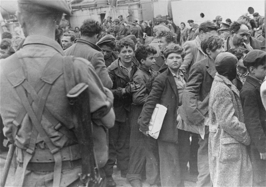 British soldiers transfer Jewish refugee children from the ship Theodor Herzl