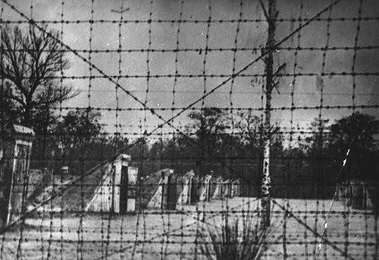  A view of the dugouts that housed prisoners in the Syrets concentration camp. [LCID: 42572]