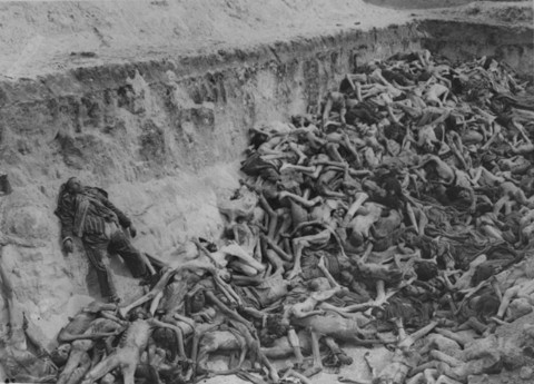 A mass grave soon after camp liberation. Bergen-Belsen, Germany, May 1945.