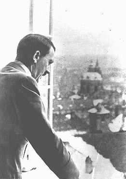 <p>Adolf Hitler looking out at occupied Prague from the Hradcany Castle. Prague, Czechoslovakia, March 15, 1939.</p>
