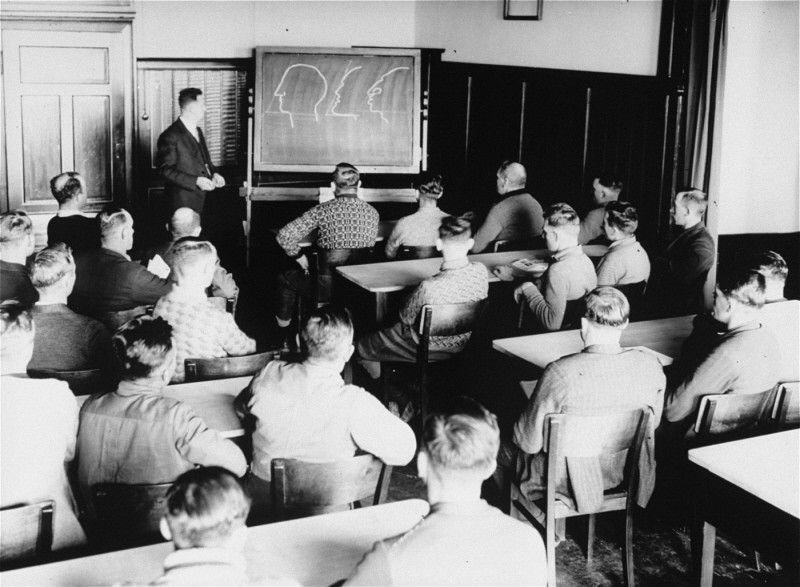 Germans attend a class in racial theory. Germany, date uncertain.