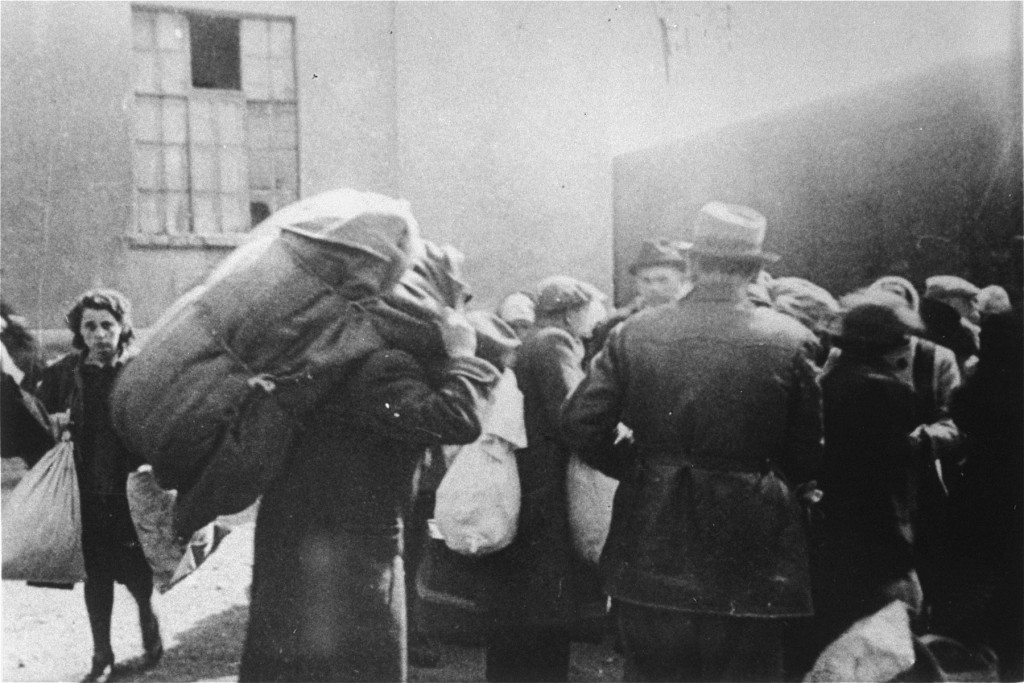 Jews from Macedonia who were rounded up and assembled in the Tobacco Monopoly transit camp in Skopje prepare to board deportation ...