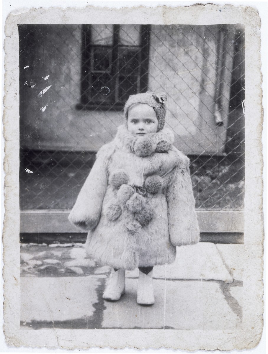 Portrait of three-year-old Estera Horn wrapped in a fur coat. [LCID: 58173]