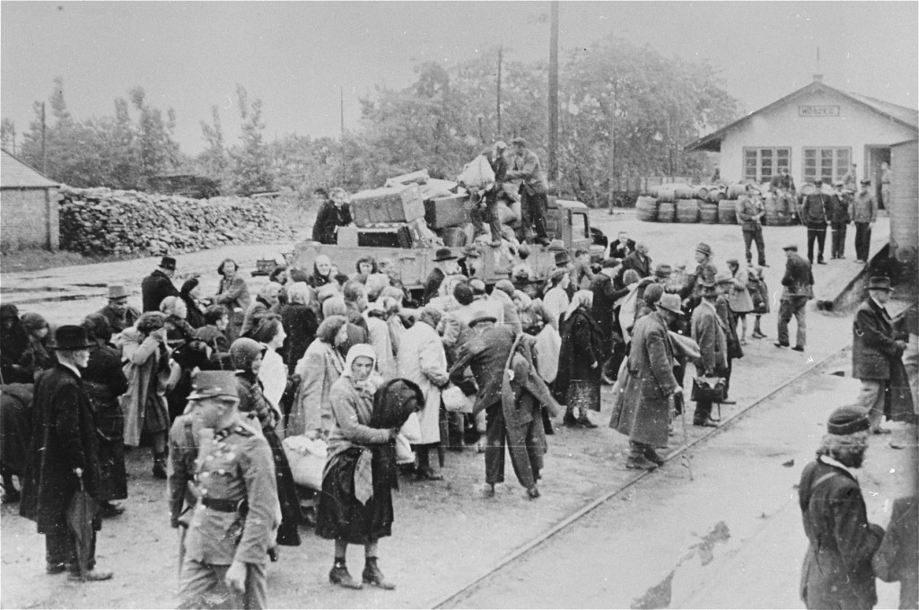 Jewish women, children and the elderly await deportation at the railroad station in Koszeg, a small town in northwestern Hungary.