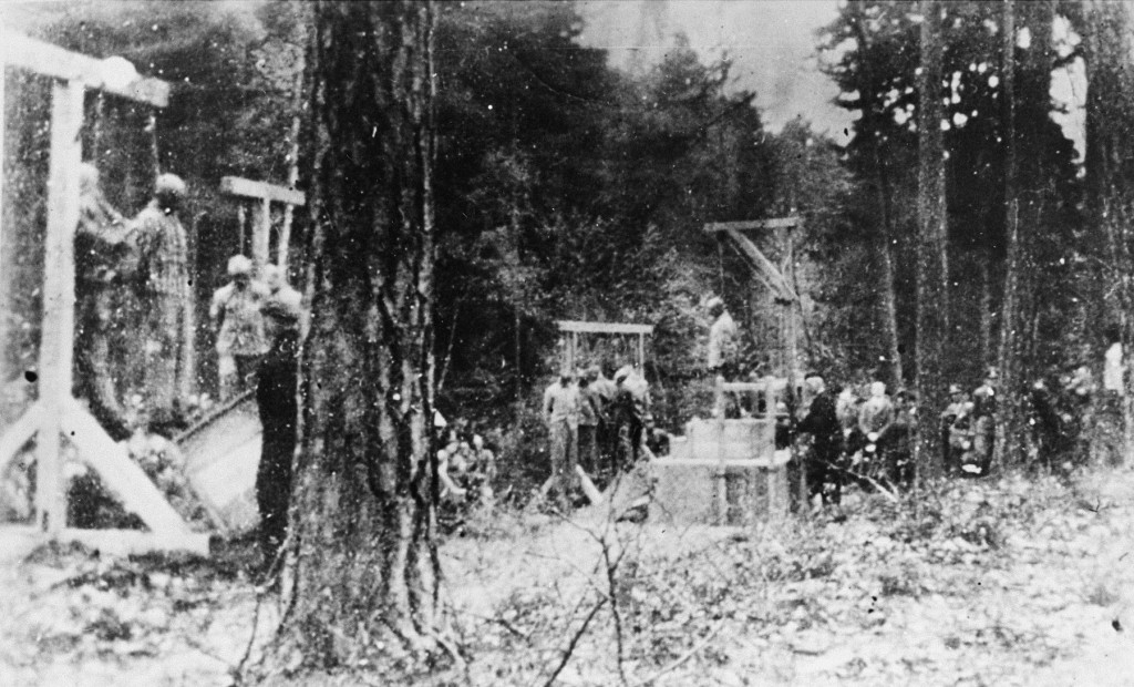 Execution of prisoners, most of them Jewish, in the forest near Buchenwald concentration camp. [LCID: 65351]