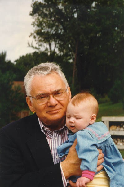 Thomas with his first grandchild, Eliza. 1996.