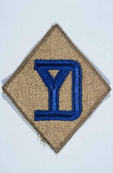 Insignia of the 26th Infantry Division. The 26th Infantry Division, the "Yankee" division, was so nicknamed to recognize the six ... [LCID: n05634]