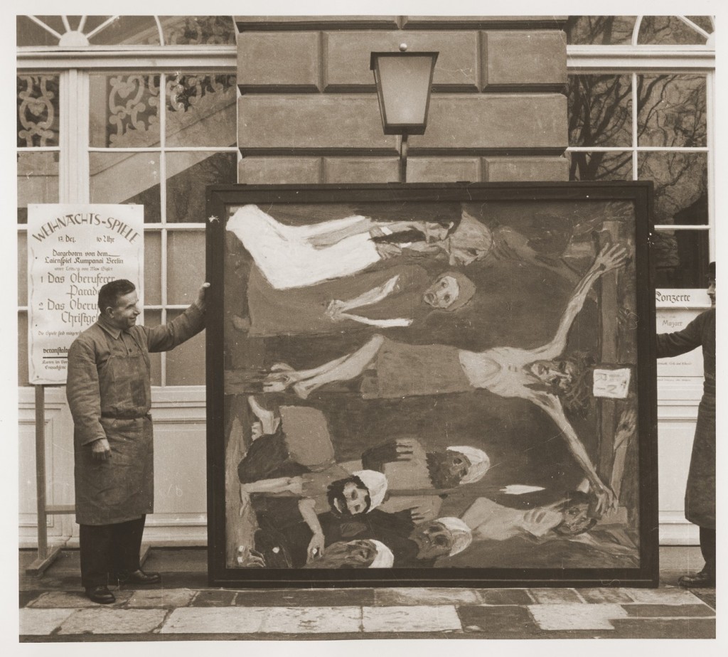 Art handlers with a confiscated artwork by Emil Nolde
