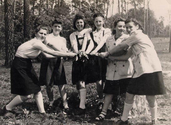 Regina (third from left) with friends while at the Dueppel displaced persons camp.