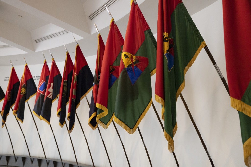 Flags of US Army liberating divisions on display at the United States Holocaust Memorial Museum.