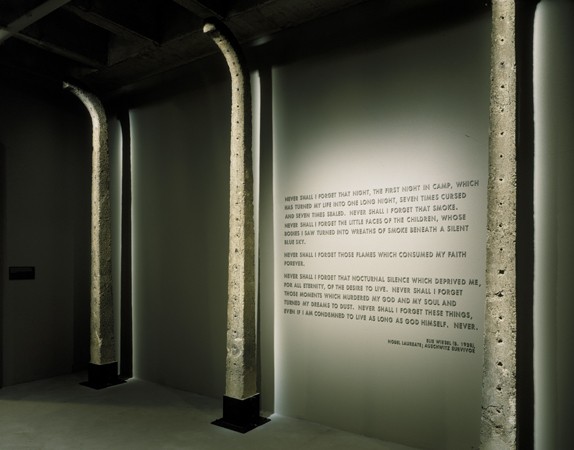Auschwitz fence posts and Elie Wiesel quote in the third floor tower room of the Permanent Exhibition at the United States Holocaust ... [LCID: n02462]