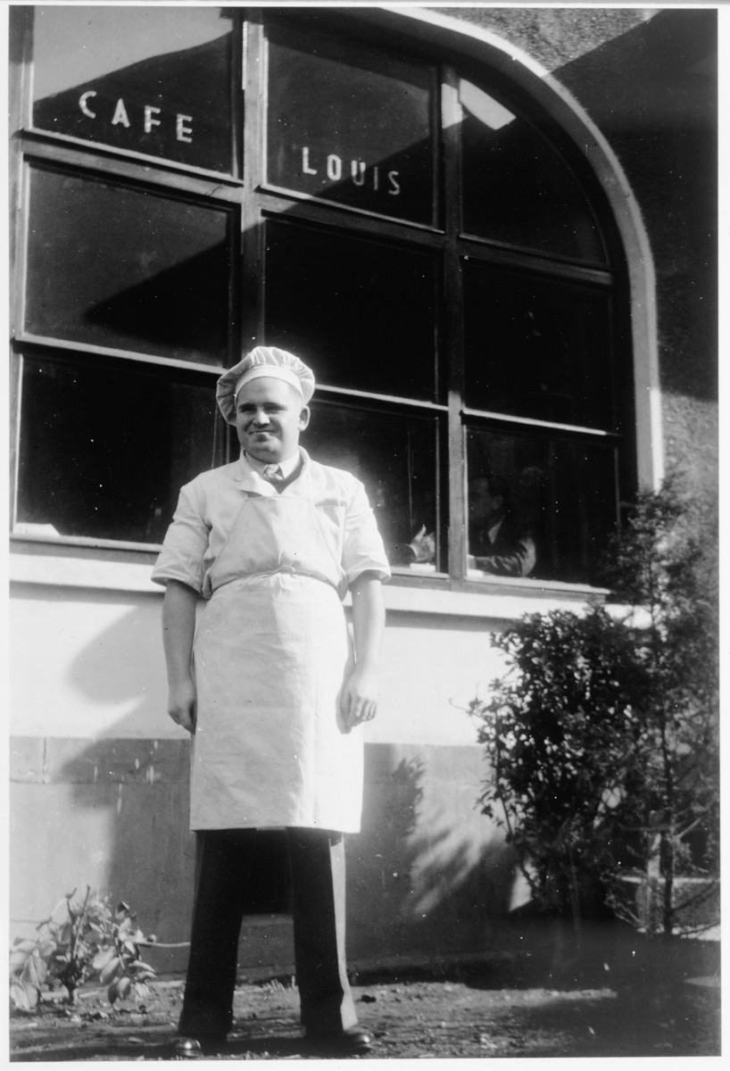 German Jewish refugee Erwin Eisfelder stands outside Cafe Louis on Ward Road.