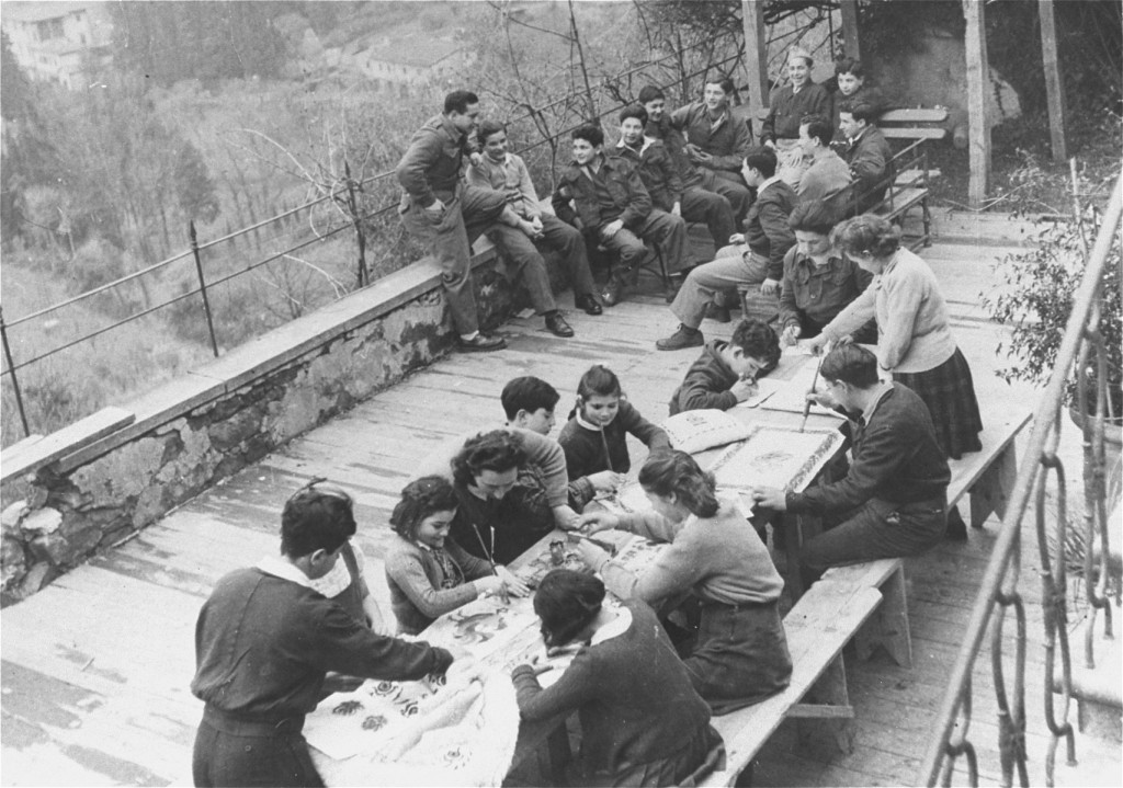 An art class for children in the Fiesole displaced persons camp, outside Florence. [LCID: 69748]