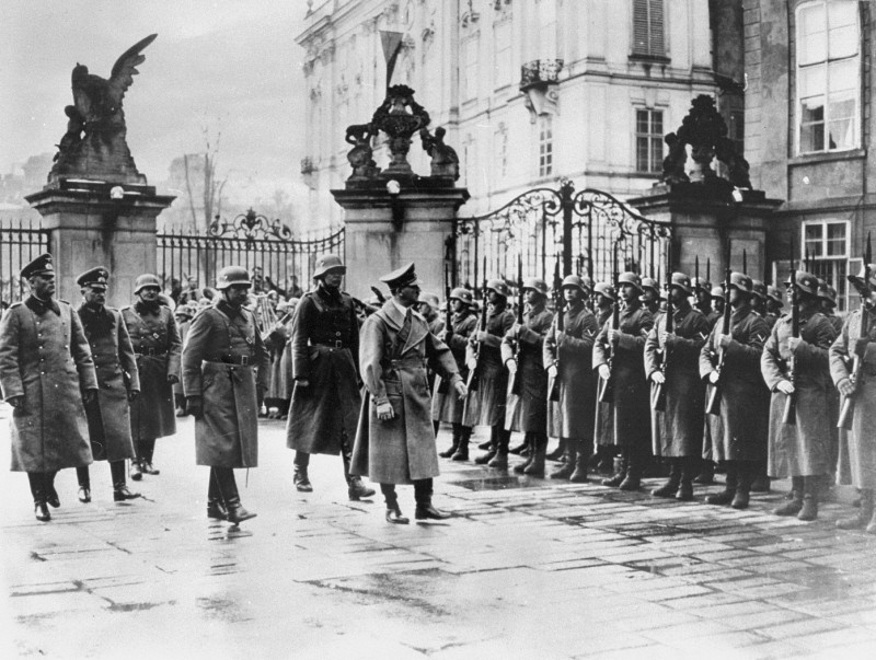 Adolf Hitler reviews his troops at Prague castle on the day of the occupation.