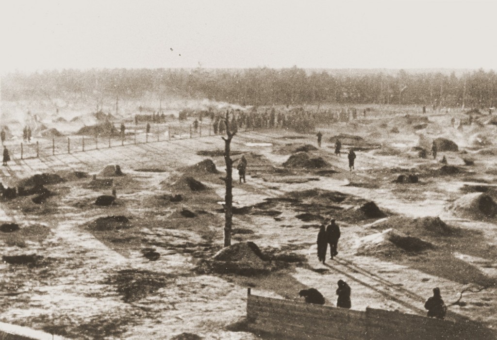 View of a camp for Soviet prisoners of war, showing the holes dug into the ground that served as shelter.
