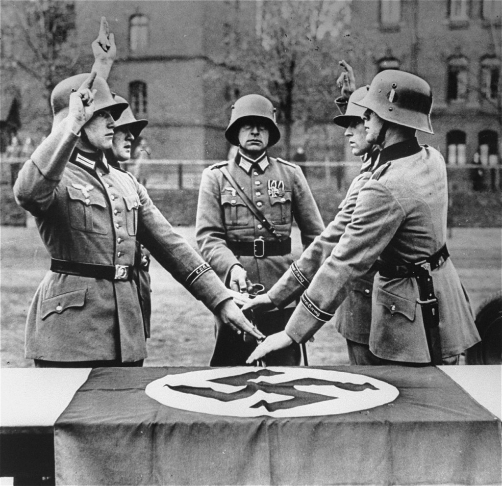 Members of a military unit swear allegiance to Hitler. [LCID: 79887]