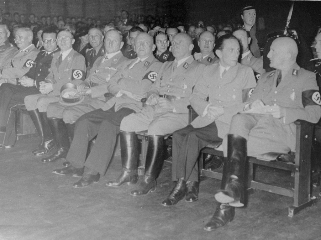 Nazi district leader of Franconia Julius Streicher (right), propaganda minister Joseph Goebbels (second from right), and other Nazi officials attend the opening of the exhibition "Der ewige Jude" (The Eternal Jew).