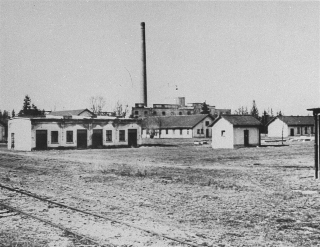 View of barracks and the ammunition factory in one of the first photos of Dachau concentration camp. [LCID: 55229]