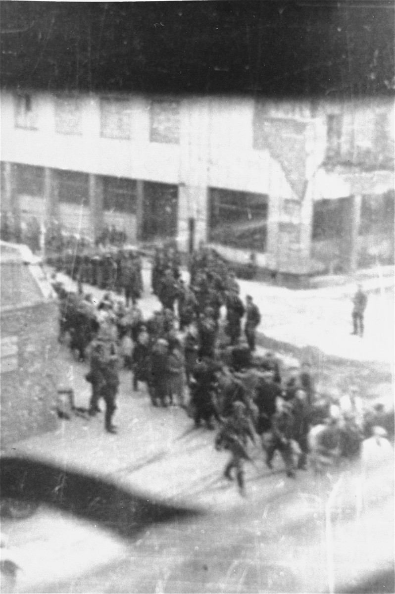 Deportation of Jews from the Warsaw ghetto during the uprising. [LCID: 80096]