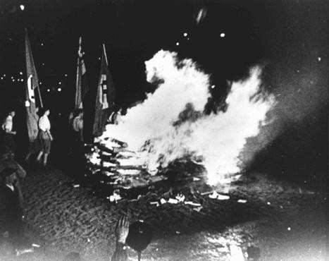 At Berlin's Opernplatz, the burning of books and other printed materials considered "un-German" by members of the SA and students from universities and colleges in Berlin.