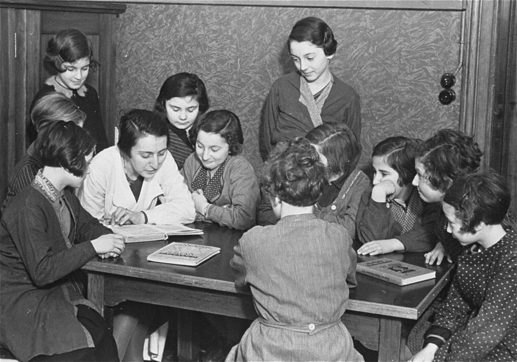 Jewish girls in the Baruch Auerbach orphanage listen to a story. [LCID: 71138]