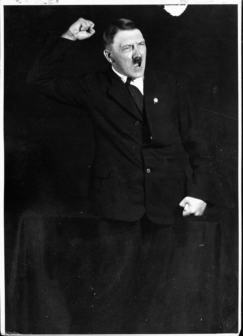 Hitler carefully cultivated his image as the Nazi Party leader as he came to see the propagandistic value of photographic publicity. Heinrich Hoffmann, Hitler’s official photographer, created the images central to the growing "Führer cult." In 1927, Hoffmann snapped action shots such as this one of Hitler rehearsing his oratory.