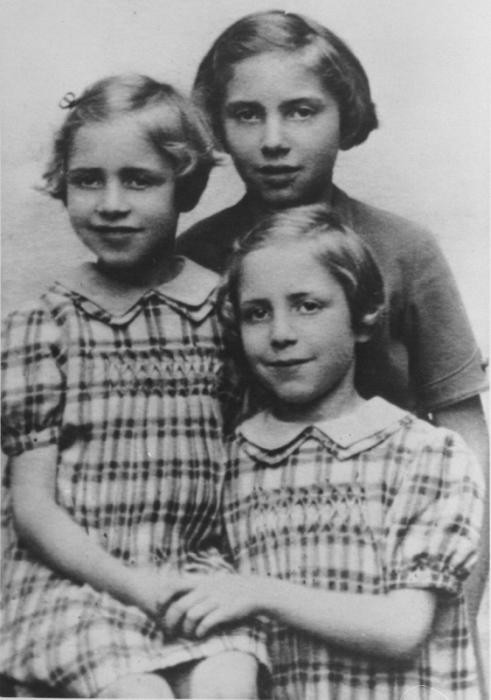 Ten-year-old Marcelle Burakowski Bock with her eight-year-old twin sisters, Berthe and Jenny.