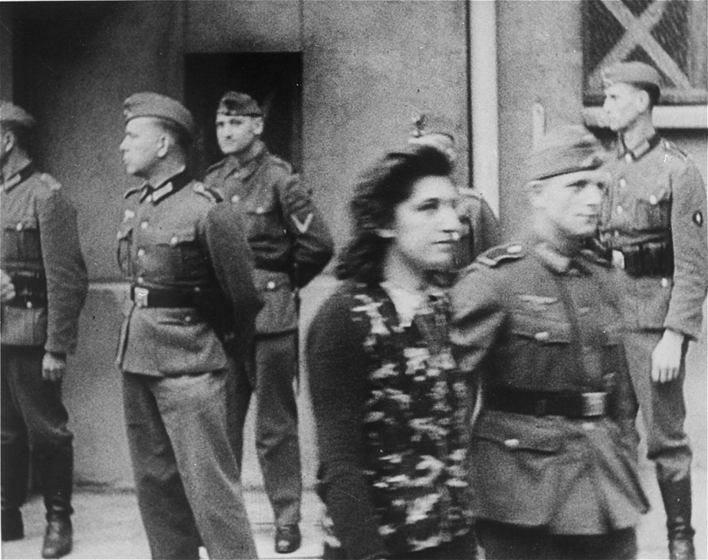 Simone Schloss, a Jewish member of the French resistance, under guard after a German military tribunal in Paris sentenced her to ... [LCID: 37164]