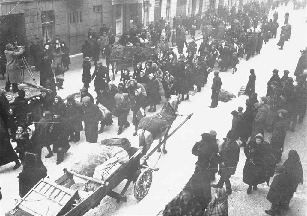 Jews deported from Germany and Austria march towards the Lodz ghetto.