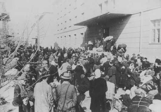 <p>Deportation of Jews from Skopje, Yugoslavia, March 1943.</p>
<p>The Jews of <a href="/narrative/5955">Bulgarian-occupied</a> Thrace and Macedonia were deported in March 1943. On March 11, 1943, over 7,000 Macedonian Jews from Skopje, Bitola, and Stip were rounded up and assembled at the Tobacco Monopoly in Skopje, whose several buildings had been hastily converted into a transit camp. The Macedonian Jews were kept there between eleven and eighteen days, before being deported by train in three transports between March 22 and 29, to Treblinka.</p>